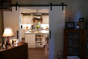 barn doors leading into the kitchen