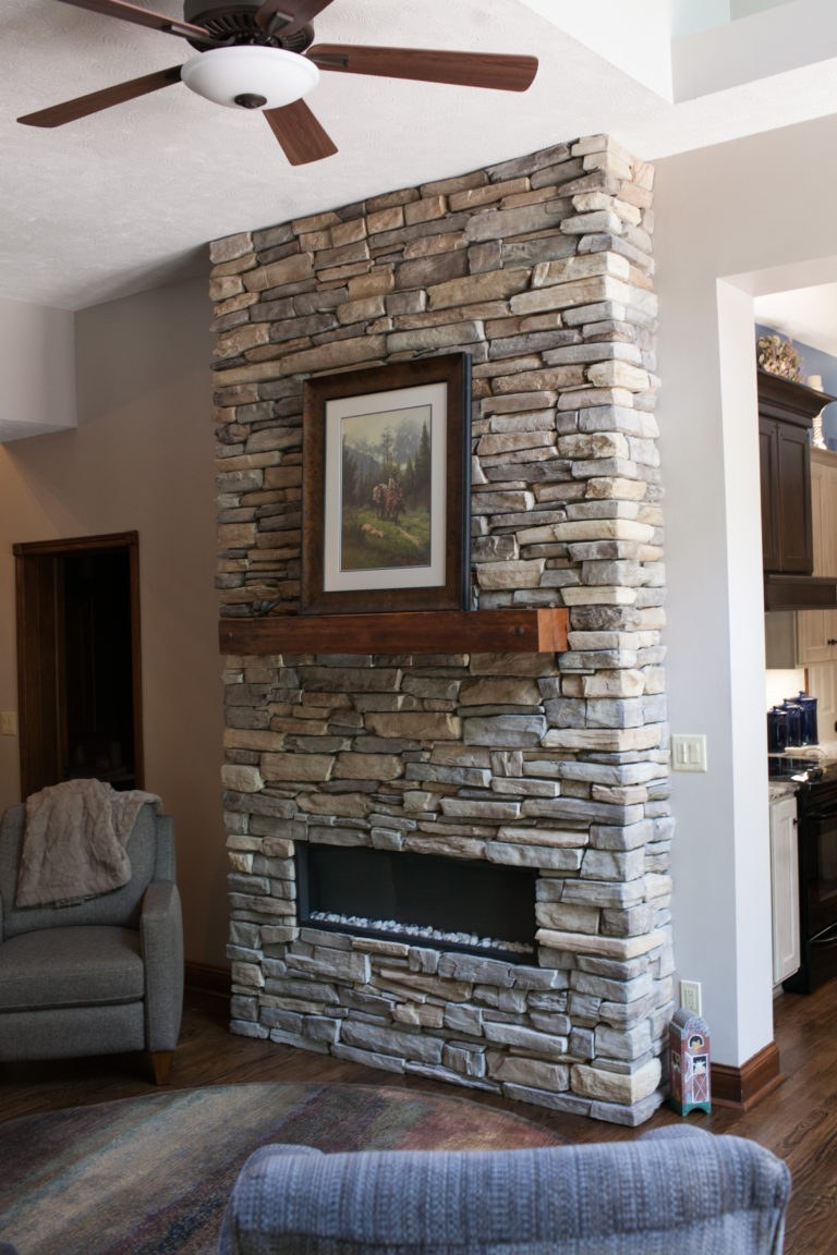 custom stacked stone fireplace - Pinnacle Homes, Inc.