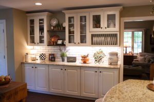 farmhouse kitchen with white cabinets and open shelving